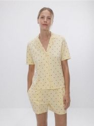 Dwuczęściowa piżama w serca - jasnożółty. Żółte piżamy Reserved, l, bez wzorów, z bawełny, bez kołnierzyka, bez ramiączek. Za 109.99 zł.