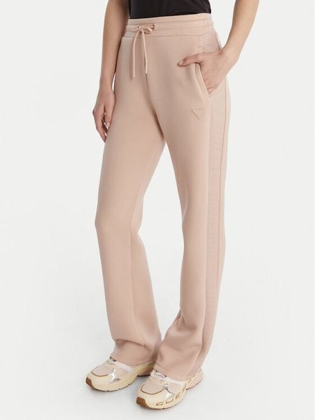 Guess Spodnie dresowe V3RB21 K7UW2 Beżowy Regular Fit. Brązowe spodnie dresowe Guess, z aplikacjami, z dresówki. Za 399.99 zł.