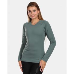 T-shirt a manica lunga da donna Kilpi SPOLETO-W. Zielone t-shirty Kilpi, l, bez wzorów, sportowe, bez kołnierzyka, bez ramiączek. Za 163.85 zł.