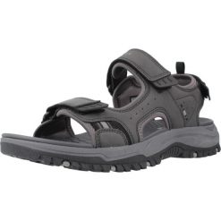 Sandały SKECHERS PREWITT Czarny. Czarne sandały Skechers, bez wzorów, z materiału, bez obcasa, bez zapięcia. Za 204.99 zł.