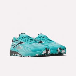 Damskie buty treningowe Reebok NANO X5 EDGE 100272190 turkusowe. Niebieskie buty treningowe Reebok, bez wzorów, bez zapięcia, na fitness i siłownię. Za 539.00 zł.
