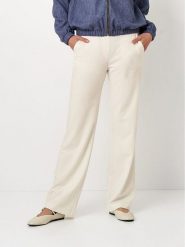 Toni Spodnie w kolorze kremowym rozmiar: W46. Brązowe spodnie materiałowe Toni, bez wzorów, z materiału. Za 152.99 zł.