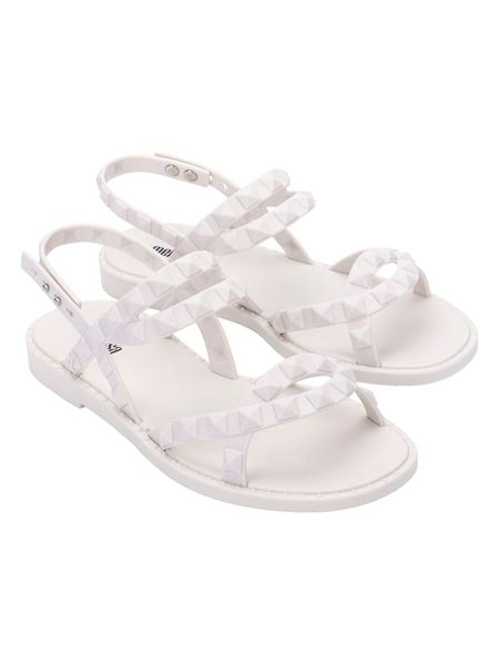 Melissa Sandały w kolorze białym rozmiar: 37. Białe sandały Melissa, bez wzorów, klasyczne, z otwartym noskiem, bez obcasa, bez zapięcia. Za 173.95 zł.