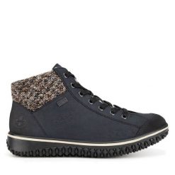 Botki Rieker. Niebieskie botki Rieker, bez wzorów, bez obcasa, na płaskiej podeszwie, bez zapięcia. Za 265.99 zł.