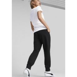 Damskie spodnie dresowe Essentials PUMA Black. Czarne spodnie dresowe Puma, bez wzorów, z dresówki. Za 214.37 zł.