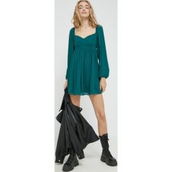 Abercrombie & Fitch sukienka kolor zielony mini rozkloszowana. Zielone sukienki Abercrombie & Fitch, s, bez wzorów, z tkaniny, bez kołnierzyka, bez ramiączek, mini, rozkloszowane. W wyprzedaży za 254.99 zł.