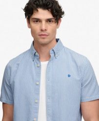 Superdry Koszula Preppy Oxford z krótkim rękawem - Bawełna organiczna. Niebieskie koszule Superdry, l, bez wzorów, z bawełny, eleganckie, bez kołnierzyka, bez ramiączek. Za 282.85 zł.