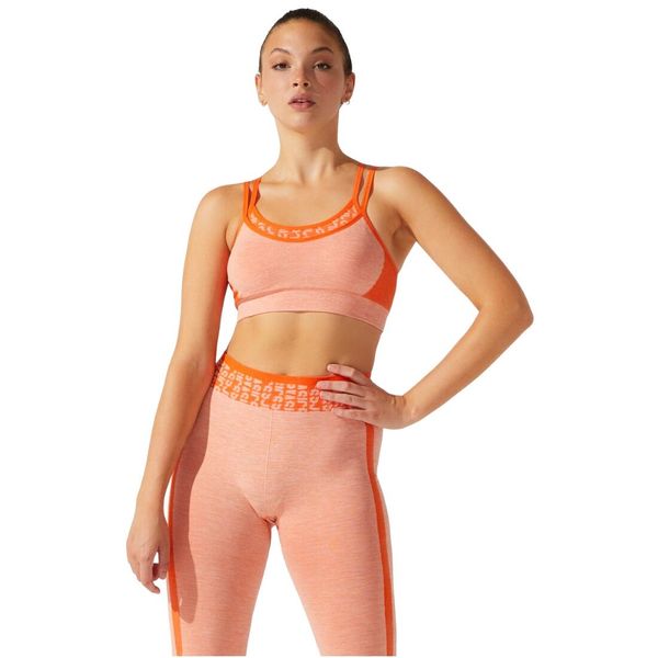 Biustonosz sportowy damski Asics Cropped Logo Seamless Bra. Brązowe biustonosze sportowe ASICS, bez wzorów, z elastanu, na fitness i siłownię. Za 89.99 zł.