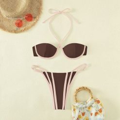 Bikini na szyję z regulowanymi zapięciami plażowe Corene. Białe bikini Intica, bez wzorów, z materiału. Za 149.00 zł.