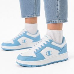 Buty damskie sportowe do chodzenia Champion RD18 2.0 LOW. Białe buty treningowe Champion, bez wzorów, z materiału, bez zapięcia, trekkingowe. Za 119.00 zł.