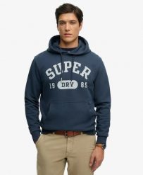 Superdry Bluza Athletic Essentials – luźny krój, bawełna i poliester z. Niebieskie bluzy Superdry, xl, bez wzorów, z bawełny, bez ramiączek, bez kaptura. Za 344.20 zł.