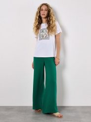 Apricot Spodnie w kolorze zielonym rozmiar: M. Zielone spodnie materiałowe Apricot, bez wzorów, z bawełny. Za 82.99 zł.