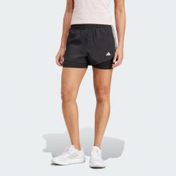 Szorty Pacer 3-Stripes Training Woven. Czarne szorty sportowe adidas, bez wzorów, z materiału, na fitness i siłownię. Za 179.00 zł.