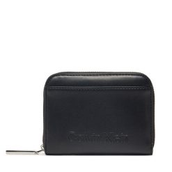 Portfel damski Calvin Klein. Czarne portfele Calvin Klein, bez wzorów. Za 169.99 zł.