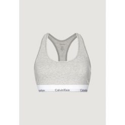 Biustonosz Kobieta CALVIN KLEIN. Szare biustonosze sportowe Calvin Klein, bez wzorów, z bawełny. Za 148.50 zł.