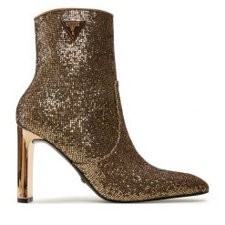 Botki Guess. Żółte botki Guess, z aplikacjami, bez obcasa, na słupku, bez zapięcia. Za 569.99 zł.