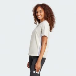 Koszulka Essentials 3-Stripes Cotton. Białe t-shirty sportowe adidas, xl, bez wzorów, z bawełny, bez ramiączek. Za 96.99 zł.