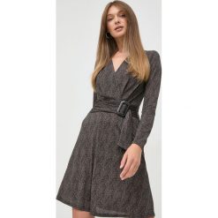 Morgan sukienka mini rozkloszowana. Sukienki Morgan, bez wzorów, z dzianiny, bez kołnierzyka, bez ramiączek, maxi, dopasowane. Za 279.99 zł.