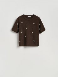 Sweter z błyszczącą aplikacją - brązowy. Brązowe swetry Reserved, l, z aplikacjami, z dzianiny, bez ramiączek. Za 119.99 zł.