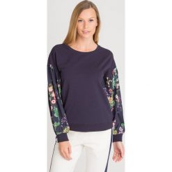 BLUZA LIU JO. Niebieskie bluzy Liu Jo, l, z aplikacjami, z bawełny, bez ramiączek, bez kaptura. Za 401.40 zł.