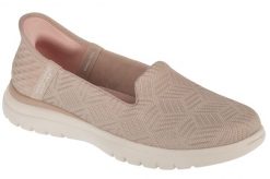 Buty do chodzenia damskie, Slip-Ins On The Go Flex - Clover. Brązowe buty treningowe Skechers, bez wzorów, z materiału, przed kostkę, bez zapięcia, trekkingowe. Za 259.99 zł.