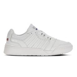 Sneakersy damskie K-Swiss SI-18 RIVAL buty sportowe skórzane na co dzień. Białe buty treningowe K-SWISS, bez wzorów, bez zapięcia. Za 229.00 zł.