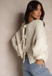 Beżowy Kardigan z Wełną o Kroju Oversize z Wiązanymi Kokardami Elearina. Brązowe swetry Renee, bez wzorów, z jeansu, eleganckie, bez ramiączek. W wyprzedaży za 127.99 zł.