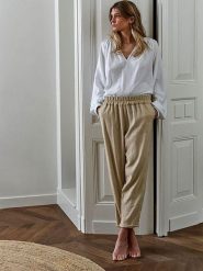 RUBY TUESDAY Spodnie "Bine" w kolorze beżowym rozmiar: 38. Brązowe spodnie materiałowe RUBY TUESDAY, bez wzorów, z bawełny. Za 201.55 zł.