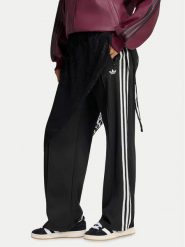 Adidas Spodnie dresowe 2In1 Firebird Loose Track Trousers With Lace Skirt LG4271 Czarny Relaxed Fit. Czarne spodnie dresowe adidas, bez wzorów, z dresówki. Za 369.99 zł.