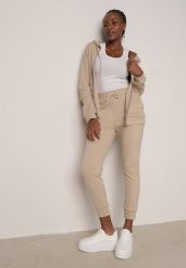 Beżowy Komplet Dresowy Zasuwana Bluza z Kapturem i Spodnie Typu Jogger Nedisare. Brązowe bluzy Born2be, l, bez wzorów, z dresówki, eleganckie, bez ramiączek, z kapturem. Za 99.99 zł.