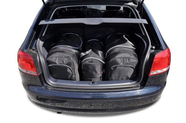Torby Do Bagażnika Audi A3 2003-2013 3Szt Kjust. Czarne torby podróżne KJUST, bez wzorów, z kauczuku. Za 986.00 zł.
