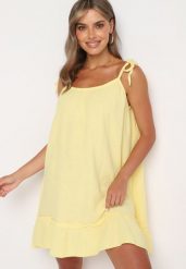 Żółta Rozkloszowana Muślinowa Sukienka z Bawełny na Wiązanych Ramiączkach Wirvia. Żółte sukienki Born2be, na spacer, z aplikacjami, z bawełny, eleganckie, bez kołnierzyka, bez ramiączek, mini, rozkloszowane. W wyprzedaży za 76.49 zł.