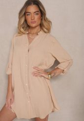 Beżowa Pudełkowa Sukienka Bawełniana Oversize z Dekoltem w Serek Elavellis. Brązowe sukienki Renee, m, bez wzorów, z bawełny, bez kołnierzyka, bez ramiączek, mini, oversize. W wyprzedaży za 67.99 zł.