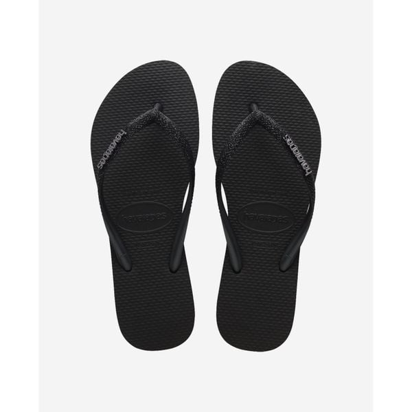 Klapki damskie Havaianas Slim Glitter II. Czarne klapki Havaianas, bez wzorów, eleganckie, bez obcasa, bez zapięcia. Za 155.85 zł.