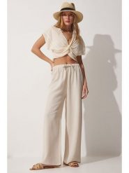 Happiness Istanbul Spodnie w kolorze beżowym rozmiar: 38. Brązowe spodnie materiałowe Happiness Istanbul, bez wzorów, z materiału, z podwyższonym stanem. Za 79.77 zł.