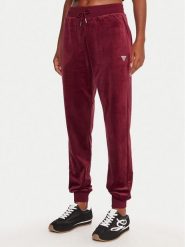 Guess Spodnie dresowe V3BB27 K0232 Bordowy Regular Fit. Czerwone spodnie dresowe Guess, z aplikacjami, z dresówki. Za 259.99 zł.