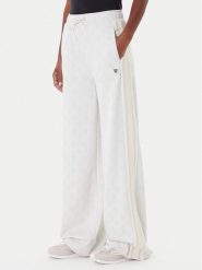 Guess Spodnie dresowe V5YB10 K0282 Écru Relaxed Fit. Spodnie sportowe Guess, z aplikacjami, z dresówki. Za 359.99 zł.