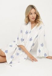 Biała Sukienka Oversize z Wiskozą Zdobiona Haftem i Falbanką Ilarith. Białe sukienki Born2be, na co dzień, l, z aplikacjami, z bawełny, eleganckie, bez kołnierzyka, bez ramiączek, midi, oversize. Za 169.99 zł.