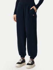 Tommy Jeans Spodnie dresowe Badge DW0DW23536 Granatowy Regular Fit. Niebieskie spodnie dresowe Tommy Jeans, bez wzorów, z bawełny. Za 329.99 zł.