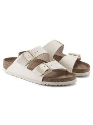 Birkenstock Klapki "Arizona" w kolorze kremowym rozmiar: 37. Brązowe klapki Birkenstock, bez wzorów, klasyczne, z otwartym noskiem, bez obcasa, bez zapięcia. Za 276.71 zł.