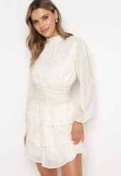 Jasnobeżowa Elegancka Sukienka z Błyszczącymi Drobinkami i Falbankami Tinaria. Brązowe sukienki Born2be, l, bez wzorów, eleganckie, bez kołnierzyka, bez ramiączek, mini. W wyprzedaży za 135.99 zł.