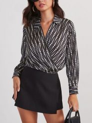 Milan Kiss Bluzka w kolorze czarno-białym rozmiar: L. Czarne bluzki Milan Kiss, l, bez wzorów, bez kołnierzyka, bez ramiączek. Za 126.99 zł.