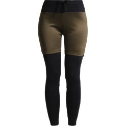 Super.natural MOUNTAIN DOUBLE LAYER Legginsy brown charcoal/jet black. Niebieskie legginsy marki comma casual identity, z materiału, casualowe. W wyprzedaży za 191.40 zł.