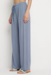 Niebieskie Bawełniane Spodnie z Gumką w Talii o Luźnym Fasonie Efraia. Niebieskie jeansy Born2be, bez wzorów, z bawełny, eleganckie. W wyprzedaży za 38.24 zł.