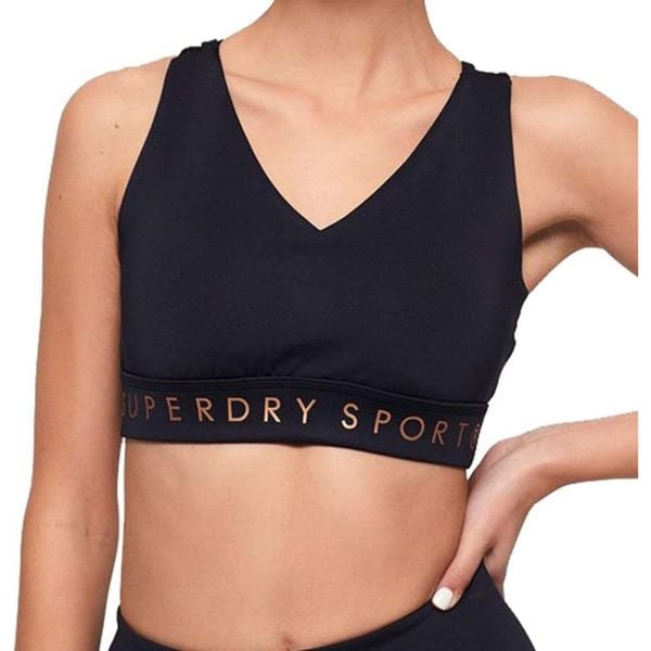 Top sportowy damski Superdry Active Studio. Niebieskie biustonosze sportowe Superdry, bez wzorów, na fitness i siłownię. Za 123.05 zł.