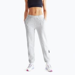 Spodnie damskie On Club. Szare spodnie dresowe On, bez wzorów, długie. Za 359.99 zł.