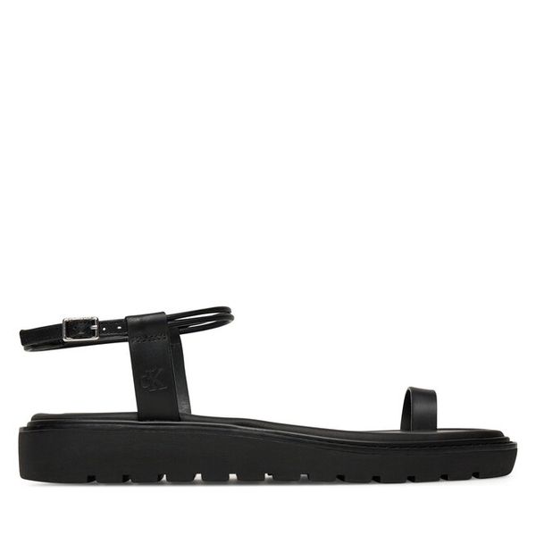 Sandały Calvin Klein Jeans. Czarne sandały Calvin Klein Jeans, bez wzorów, z jeansu, bez obcasa, na płaskiej podeszwie, bez zapięcia. Za 218.99 zł.