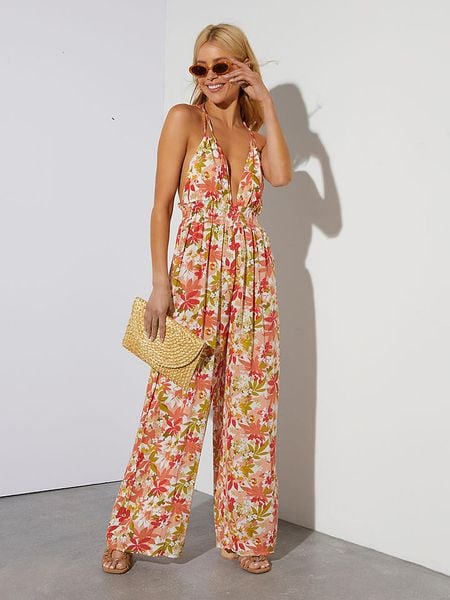 Milan Kiss Kombinezon w kolorze czerwono-zielono-białym rozmiar: M. Czerwone kombinezony Milan Kiss, m, bez wzorów, bez kołnierzyka, bez ramiączek. Za 91.77 zł.