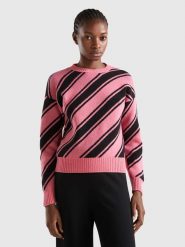 Benetton Wełniany sweter w kolorze różowo-czarnym rozmiar: M. Czarne swetry Benetton, m, bez wzorów, z wełny, bez ramiączek. Za 127.35 zł.