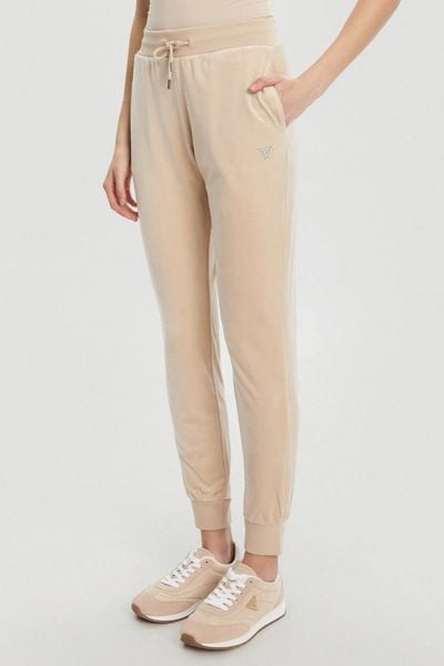 GUESS Beżowe damskie spodnie dresowe Couture, Rozmiar S. Brązowe spodnie dresowe Guess, z aplikacjami, z dresówki. W wyprzedaży za 207.99 zł.